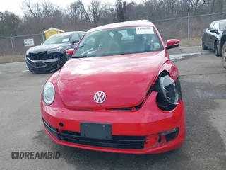 2012 Volkswagen Beetle 2.5L PZEV with VIN 3VWJP7AT4CM608099, listed as a IAAI auction lot 41566505 with 130,189 mi miles. Bid and sale history available at carsss.com. Image 12.