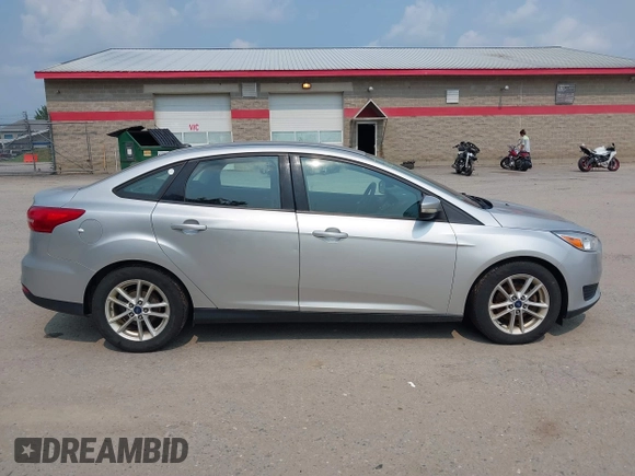 2015 Ford Focus SE с VIN 1FADP3F21FL203452, выставлен на аукционе IAAI как лот 40119573 с пробегом 143 915 миль миль и . История ставок и продаж доступна на DreamBid. Изображение 14.