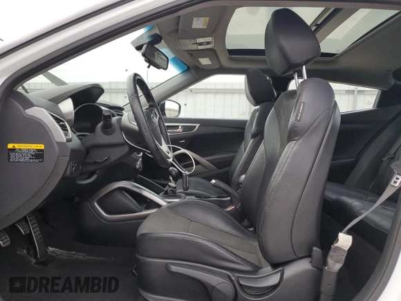 2014 Hyundai Veloster with VIN KMHTC6ADXEU184741, listed as a Copart auction lot 81136964 with 85,453 mi miles and Salvage Title. Bid and sale history available at carsss.com. Image 7.