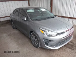 2021 Kia Rio S with VIN 3KPA24ADXME406680, listed as a IAAI auction lot 41094640 with 118,435 mi miles. Bid and sale history available at carsss.com. Image 1.