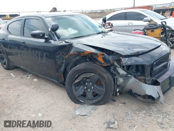 2009 Dodge Charger Police with VIN 2B3KA43T09H571873, listed as a IAAI auction lot 41842926 with 137,004 mi miles and . Bid and sale history available at carsss.com. Image 6.