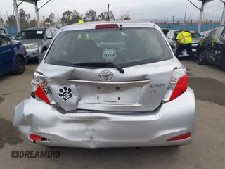 2012 Toyota Yaris L with VIN JTDKTUD30CD525956, listed as a IAAI auction lot 42057788 with 191,307 mi miles. Bid and sale history available at carsss.com. Image 16.