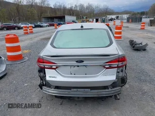 2017 Ford Fusion Titanium с VIN 3FA6P0SU0HR409820, выставлен на аукционе IAAI как лот 41919527 с пробегом 77 301 миль миль и . История ставок и продаж доступна на DreamBid. Изображение 16.