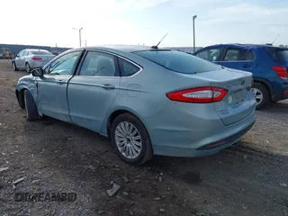 2014 Ford Fusion SE Hybrid with VIN 3FA6P0LU2ER168949, listed as a IAAI auction lot 40366468 with 188,802 mi miles. Bid and sale history available at carsss.com. Image 3.