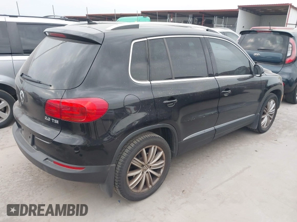 2012 Volkswagen Tiguan SE with VIN WVGAV7AX9CW611202, listed as a IAAI auction lot 41944210 with 118,002 mi miles and . Bid and sale history available at DreamBid. Image 4.