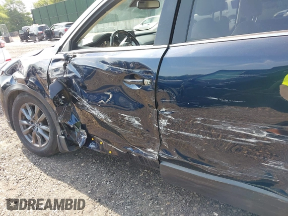 2021 Mazda CX-9 Touring with VIN JM3TCBCY7M0507699, listed as a IAAI auction lot 42603614 with 62,635 mi miles and . Bid and sale history available at DreamBid. Image 18.
