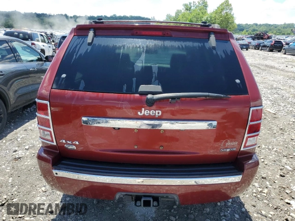 2009 Jeep Grand Cherokee with VIN 1J8HR68T29C512518, listed as a Copart auction lot 58894174 with 113,181 mi miles and Salvage title. Bid and sale history available at DreamBid. Image 6.