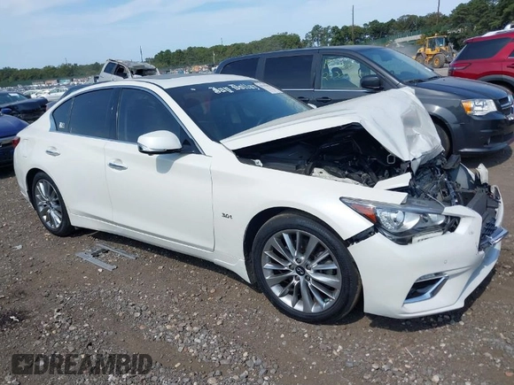2019 Infiniti Q50 Luxe with VIN JN1EV7ARXKM557946, listed as a IAAI auction lot 40362058 with 56,615 mi miles and . Bid and sale history available at carsss.com. Image 1.