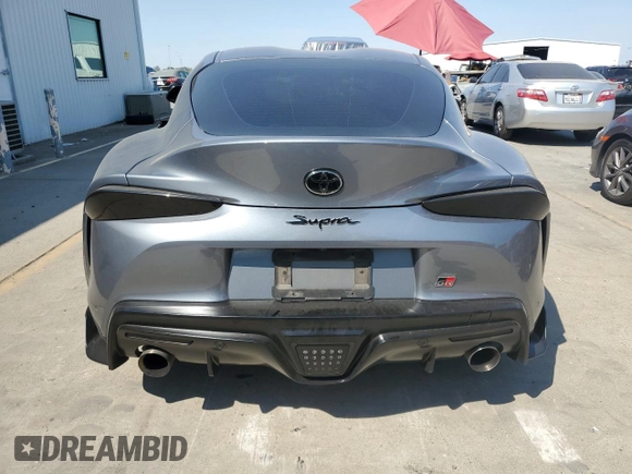 2021 Toyota GR Supra 3.0 with VIN WZ1DB0C01MW042477, listed as a Copart auction lot 70084924 with 59,925 mi miles and Salvage Title. Bid and sale history available at carsss.com. Image 6.