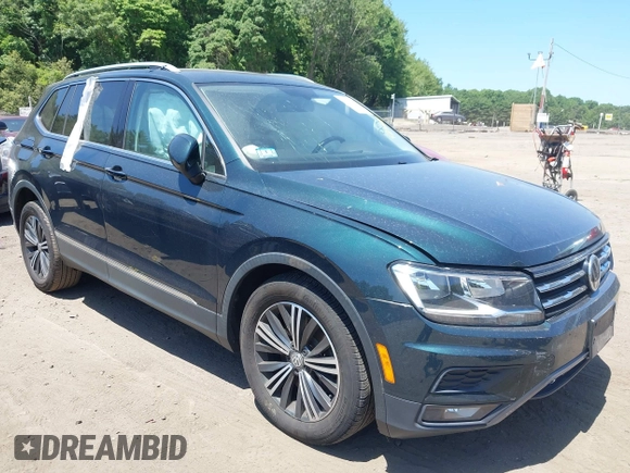 2018 Volkswagen Tiguan SEL with VIN 3VV2B7AX9JM058518, listed as a IAAI auction lot 42558129 with 82,807 mi miles and . Bid and sale history available at DreamBid. Image 1.