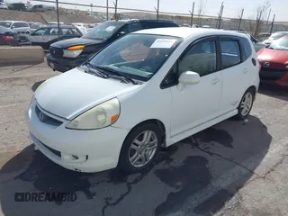 2007 Honda Fit Sport z VIN JHMGD38657S030086, wystawiony jako IAAI lot #41699824 z przebiegiem 224 648 mil mil oraz . Historia ofert i sprzedaży dostępna na DreamBid. Obrazek 2.