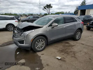2019 Cadillac XT5 Luxury AWD with VIN 1GYKNDRS0KZ159132, listed as a Copart auction lot 57838155 with 94,289 mi miles and Clean title. Bid and sale history available at DreamBid. Image 1.
