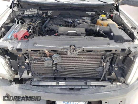 2014 Ford F-150 XL with VIN 1FTMF1CM7EKE73491, listed as a Copart auction lot 59908755 with 205,265 mi miles and Non repairable. Bid and sale history available at DreamBid. Image 11.