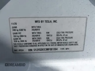 2021 Tesla Model Y Long Range with VIN 5YJYGDEE3MF081304, listed as a IAAI auction lot 41706240 with 90,510 mi miles and . Bid and sale history available at DreamBid. Image 9.