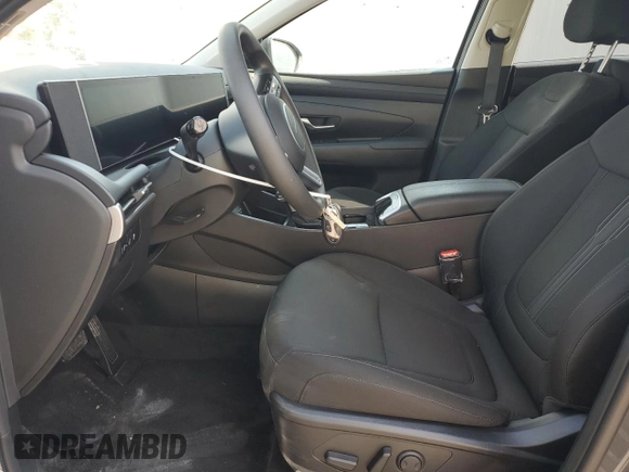 2025 Hyundai Tucson SEL with VIN 5NMJB3DE8SH481267, listed as a Copart auction lot 54500005 with 10,986 mi miles and Salvage Title. Bid and sale history available at DreamBid. Image 7.