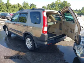 2005 Honda CR-V EX with VIN SHSRD78865U314431, listed as a IAAI auction lot 40206182 with 164,015 mi miles. Bid and sale history available at carsss.com. Image 3.