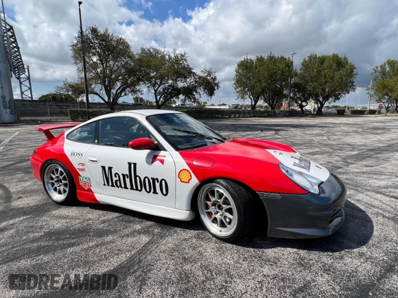 2004 Porsche 911 z VIN WP0AC299X4S692464, wystawiony jako Copart lot #50950705 z przebiegiem 44 494 mil mil oraz Czysty tytuł • Clean title. Historia ofert i sprzedaży dostępna na DreamBid. Obrazek 3.