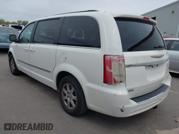 2013 Chrysler Town & Country Touring with VIN 2C4RC1BG4DR648838, listed as a IAAI auction lot 42004977 with 218,814 mi miles. Bid and sale history available at carsss.com. Image 3.
