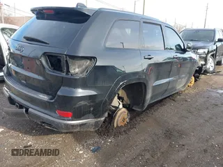 2018 Jeep Grand Cherokee High Altitude with VIN 1C4RJFCT9JC325436, listed as a IAAI auction lot 41189143 with 116,785 mi miles. Bid and sale history available at carsss.com. Image 4.