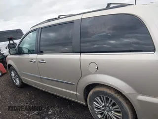 2016 Chrysler Town & Country Touring z VIN 2C4RC1CG5GR166771, wystawiony jako IAAI lot #41715807 z przebiegiem 121 652 mil mil oraz . Historia ofert i sprzedaży dostępna na DreamBid. Obrazek 14.