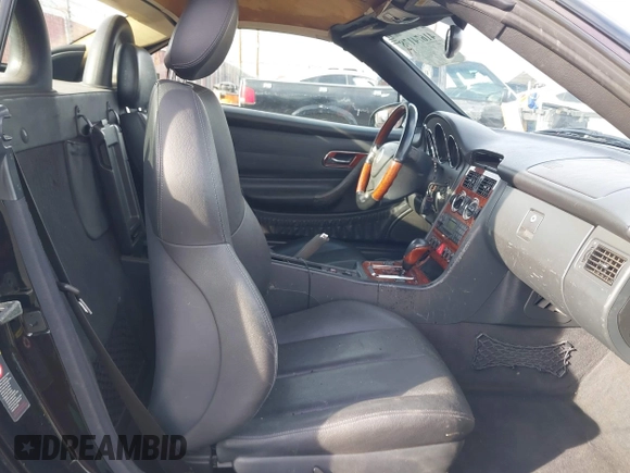 2003 Mercedes-Benz SLK 320 with VIN WDBKK65F43F281612, listed as a IAAI auction lot 41674178 with 153,517 mi miles and . Bid and sale history available at DreamBid. Image 5.