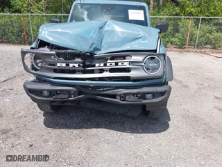 2022 Ford Bronco with VIN 1FMDE5BH9NLB83791, listed as a IAAI auction lot 42020801 with 26,141 mi miles. Bid and sale history available at carsss.com. Image 6.