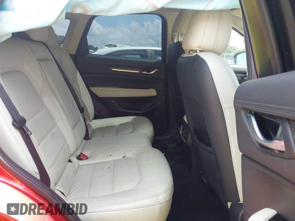 2018 Mazda CX-5 Grand Touring with VIN JM3KFADM4J0335913, listed as a IAAI auction lot 42326044 with 104,583 mi miles and . Bid and sale history available at DreamBid. Image 8.