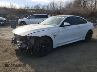 2015 BMW M4 with VIN WBS3R9C56FK329676, listed as a Copart auction lot 39219683 with 84,307 mi miles. Bid and sale history available at carsss.com. Image 1.