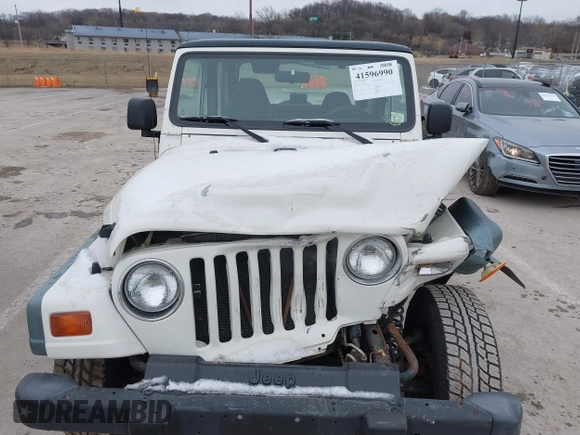 1998 Jeep Wrangler SE with VIN 1J4FY29P9WP793260, listed as a IAAI auction lot 41596990 with 90,766 mi miles. Bid and sale history available at carsss.com. Image 6.