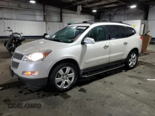 2012 Chevrolet Traverse LTZ z VIN 1GNKVLED1CJ155380, wystawiony jako Copart lot #56052595 z przebiegiem 130 985 mil mil oraz Szkoda całkowita • Salvage title. Historia ofert i sprzedaży dostępna na DreamBid. Obrazek 1.