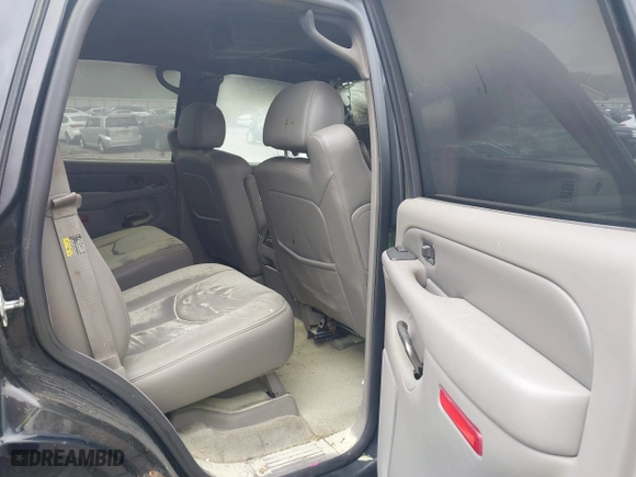 2004 GMC Yukon Denali with VIN 1GKEK63U54J308934, listed as a IAAI auction lot 42124676 with 254,362 mi miles. Bid and sale history available at carsss.com. Image 8.