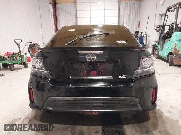 2014 Scion tC z VIN JTKJF5C74E3086243, wystawiony jako IAAI lot #40983287 z przebiegiem Nie podano mil oraz . Historia ofert i sprzedaży dostępna na DreamBid. Obrazek 17.