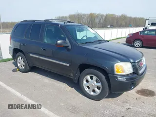 2005 GMC Envoy SLE with VIN 1GKDT13S052299632, listed as a IAAI auction lot 41966628 with 199,312 mi miles and . Bid and sale history available at DreamBid. Image 1.