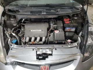 2007 Honda Fit with VIN JHMGD38437S002477, listed as a Copart auction lot 72065034 with 59,192 mi miles and Salvage Title. Bid and sale history available at carsss.com. Image 11.