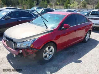 2014 Chevrolet Cruze 1LT with VIN 1G1PC5SB4E7322259, listed as a IAAI auction lot 41979829 with 193,434 mi miles. Bid and sale history available at carsss.com. Image 2.