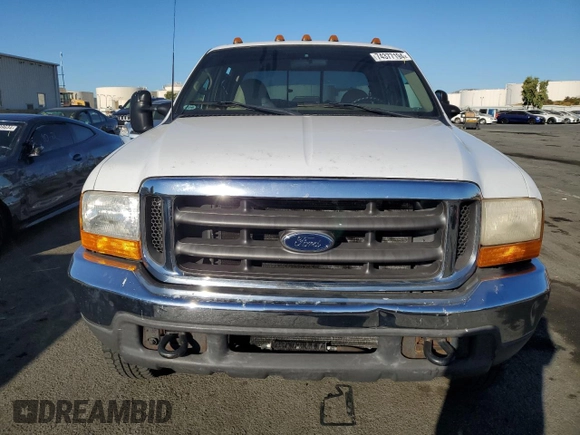 2000 Ford Super Duty F-250 XL with VIN 1FTNW21S1YED65639, listed as a Copart auction lot 74377194 with 158,387 mi miles and Salvage Title. Bid and sale history available at carsss.com. Image 5.