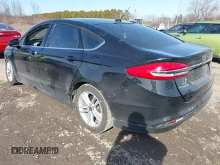 2018 Ford Fusion Hybrid S with VIN 3FA6P0UU4JR101262, listed as a IAAI auction lot 41808442 with 67,537 mi miles. Bid and sale history available at carsss.com. Image 3.