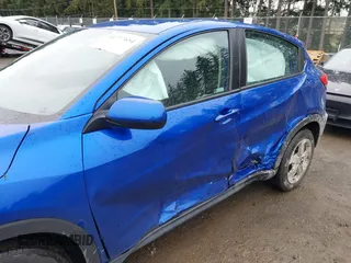 2018 Honda HR-V LX with VIN 3CZRU6H37JM712432, listed as a IAAI auction lot 41777654 with 14,385 mi miles. Bid and sale history available at carsss.com. Image 6.