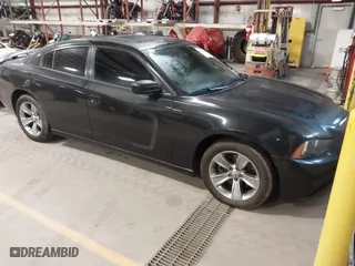 2011 Dodge Charger RT Plus with VIN 2B3CL5CT9BH511648, listed as a IAAI auction lot 41734392 with 103,112 mi miles. Bid and sale history available at carsss.com. Image 1.
