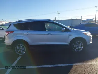 2014 Ford Escape Titanium with VIN 1FMCU9J94EUD01966, listed as a IAAI auction lot 41226043 with 132,730 mi miles. Bid and sale history available at carsss.com. Image 13.