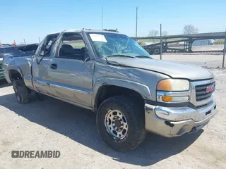 2003 GMC Sierra 2500HD SLE z VIN 1GTHK29173E195638, wystawiony jako IAAI lot #42055178 z przebiegiem 319 618 mil mil oraz . Historia ofert i sprzedaży dostępna na DreamBid. Obrazek 1.