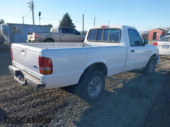 1997 Ford Ranger XLT with VIN 1FTCR10A2VUA40419, listed as a IAAI auction lot 41425447 with 229,314 mi miles. Bid and sale history available at carsss.com. Image 4.