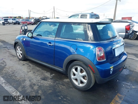 2009 MINI Hardtop with VIN WMWMF335X9TW71208, listed as a IAAI auction lot 41535653 with 148,660 mi miles and . Bid and sale history available at DreamBid. Image 3.