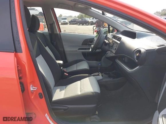 2014 Toyota Prius c One with VIN JTDKDTB32E1065438, listed as a IAAI auction lot 37350203 with 94,630 mi miles. Bid and sale history available at carsss.com. Image 5.