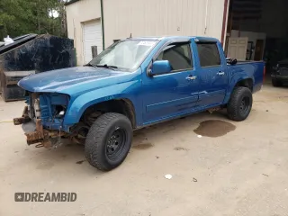 2011 GMC Canyon SLE1 with VIN 1GTH6MFE3B8119385, listed as a Copart auction lot 70492994 with 105,305 mi miles and Salvage Title. Bid and sale history available at carsss.com. Image 1.