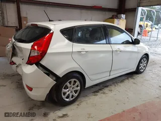 2013 Hyundai Accent GL with VIN KMHCT5AE6DU122559, listed as a IAAI auction lot 41800714 with 129,582 mi miles. Bid and sale history available at carsss.com. Image 4.