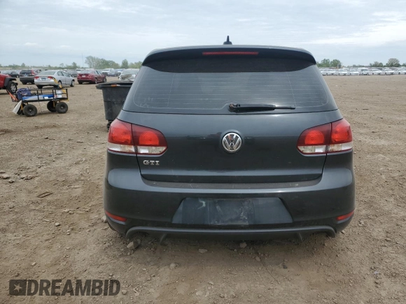 2013 Volkswagen GTI z VIN WVWEV7AJ2DW125334, wystawiony jako Copart lot #57248175 z przebiegiem Nie podano mil oraz Szkoda całkowita • Salvage title. Historia ofert i sprzedaży dostępna na DreamBid. Obrazek 6.
