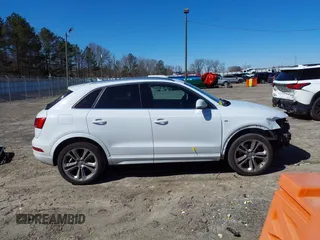 2018 Audi Q3 Premium Plus z VIN WA1JCCFS9JR019286, wystawiony jako IAAI lot #41607434 z przebiegiem 128 709 mil mil oraz . Historia ofert i sprzedaży dostępna na DreamBid. Obrazek 14.