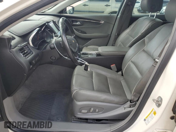 2014 Chevrolet Impala LTZ with VIN 2G1155S39E9316657, listed as a Copart auction lot 52232375 with 122,512 mi miles and Salvage Title. Bid and sale history available at DreamBid. Image 7.