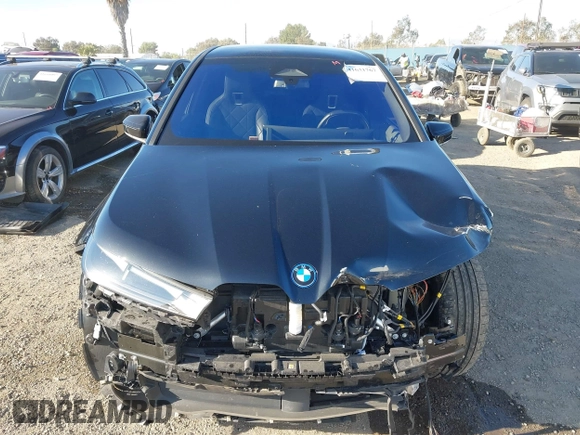 2022 BMW iX xDrive50 z VIN WB523CF07NCJ80006, wystawiony jako IAAI lot #41631767 z przebiegiem 28 311 mil mil oraz . Historia ofert i sprzedaży dostępna na DreamBid. Obrazek 13.